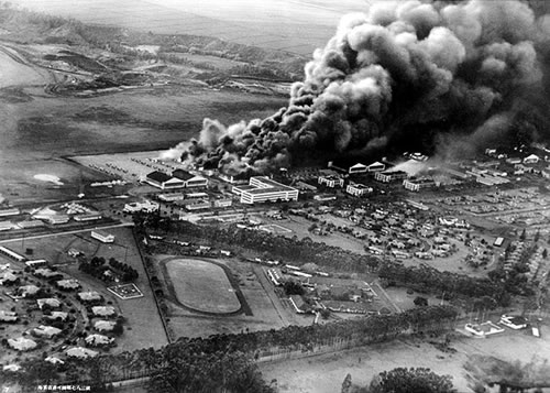 Burning planes and hangars at the Wheeler Field.